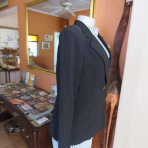 High class black OASIS long sleeve lined jacket. Stitching detail.One button closure.Size 36.As new.
