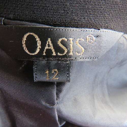 High class black OASIS long sleeve lined jacket. Stitching detail.One button closure.Size 36.As new.