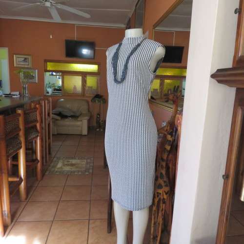 Smart white/black/grey vertical striped woven stretch polyester sleeveless IQ dress size 34 to 36.
