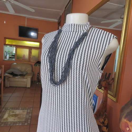 Smart white/black/grey vertical striped woven stretch polyester sleeveless IQ dress size 34 to 36.