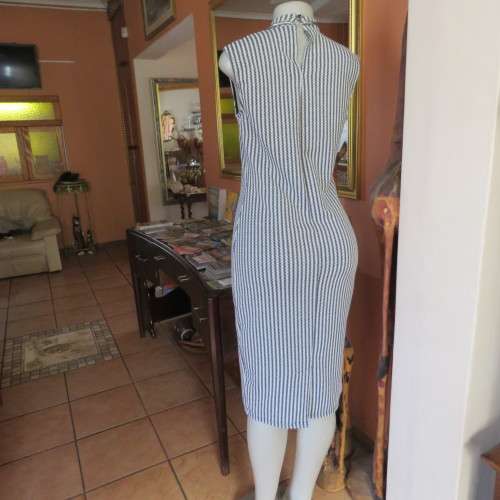 Smart white/black/grey vertical striped woven stretch polyester sleeveless IQ dress size 34 to 36.