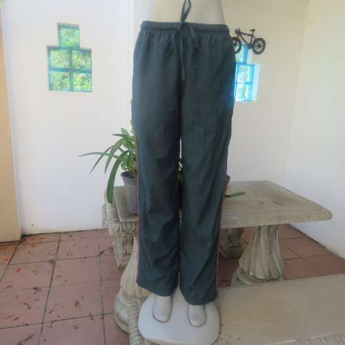 High quality sweatpants size 34/10 by WOOLWORTHS in castleton green nylon/white polycotton inner.
