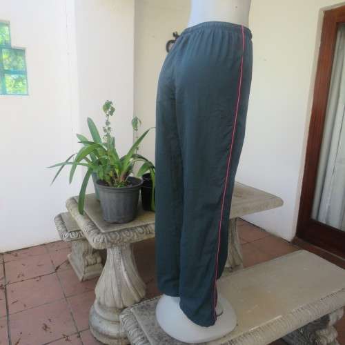 High quality sweatpants size 34/10 by WOOLWORTHS in castleton green nylon/white polycotton inner.