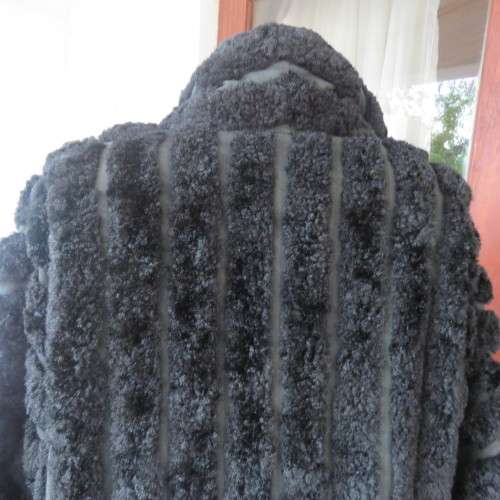 Vintage DE PARIS black faux fur jacket. Size 40. Elbow sleeves. Kangaroo pockets. Open front.