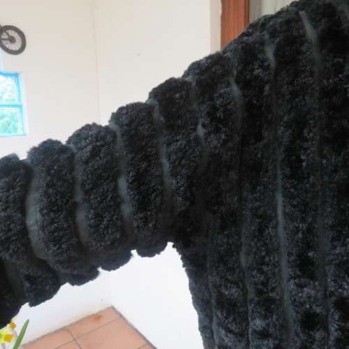 Vintage DE PARIS black faux fur jacket. Size 40. Elbow sleeves. Kangaroo pockets. Open front.