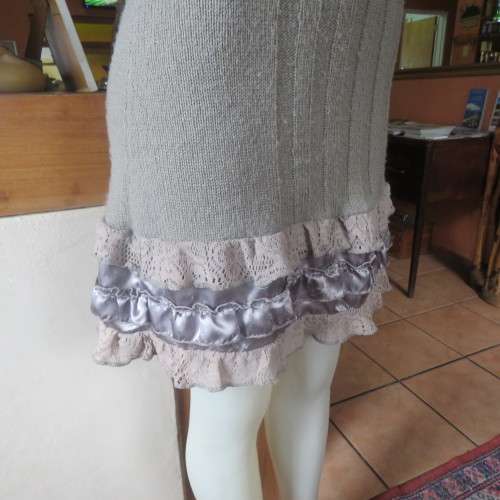 Unique ecru colour knitted dress in wool/poly and acrylic yarn.Scooped decorated neck.Size 36.As new