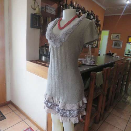Unique ecru colour knitted dress in wool/poly and acrylic yarn.Scooped decorated neck.Size 36.As new
