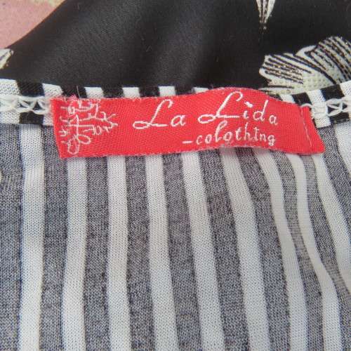 Silky long black/white vertical stretch sexy sleeveless top. Size 38 by LA LIDA. Unique front inlays