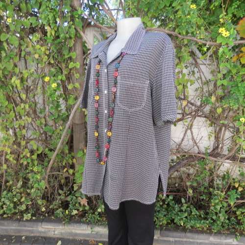 Classic short sleeve black/white check button down shirt. By DONNA CLAIRE size 42/18.Front pockets.