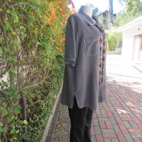 Classic short sleeve black/white check button down shirt. By DONNA CLAIRE size 42/18.Front pockets.