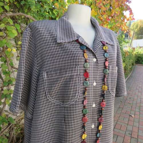 Classic short sleeve black/white check button down shirt. By DONNA CLAIRE size 42/18.Front pockets.