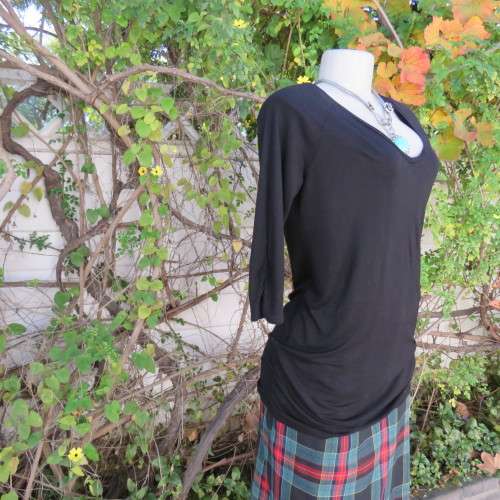 Casual long black viscose stretch top with gathered bottom sides.Elbow sleeves.By WOOLWORTHS size 36
