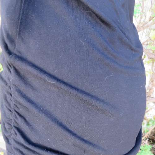 Casual long black viscose stretch top with gathered bottom sides.Elbow sleeves.By WOOLWORTHS size 36