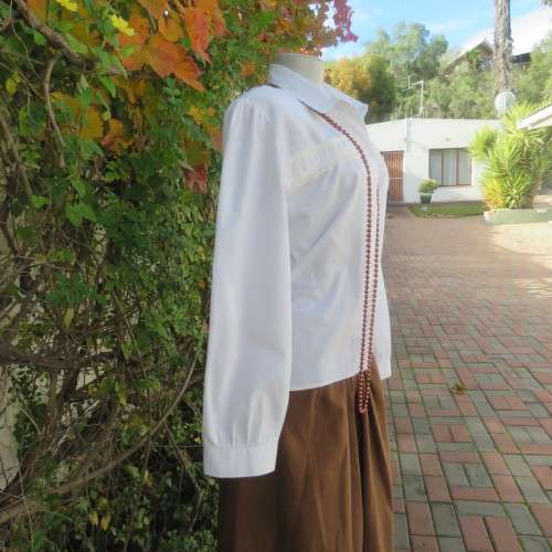 Warm pure cotton long cuffed sleeve light cream button down vintage style blouse.By BUS STOP size 38