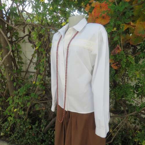 Warm pure cotton long cuffed sleeve light cream button down vintage style blouse.By BUS STOP size 38