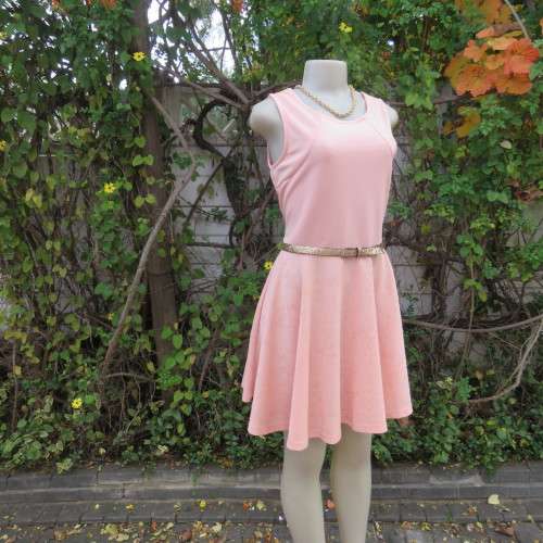 Sweet light peach stretch polyester skater style sleeveless dress by RT in size 36/12. Low back.