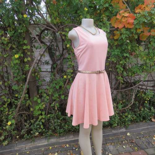 Sweet light peach stretch polyester skater style sleeveless dress by RT in size 36/12. Low back.