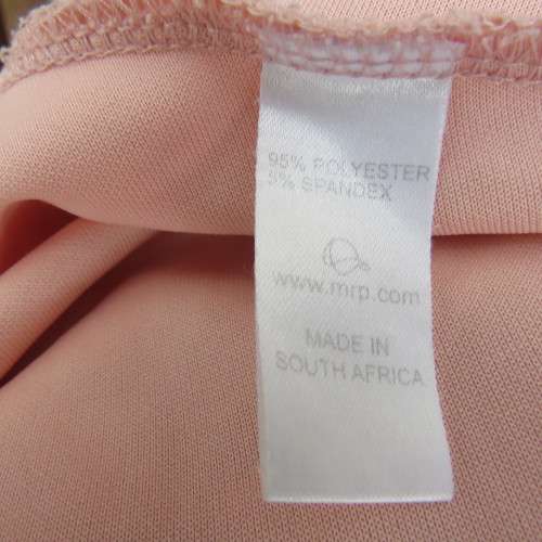 Sweet light peach stretch polyester skater style sleeveless dress by RT in size 36/12. Low back.