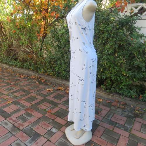 Maxi sleek adriatic mist slip over cotton sleeveless dress with white/navy flowers. Size 34. As new.