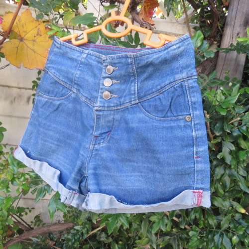 Cute denim shorts by PINK ANGEL for 8 to 9 yr old girl. Unique wide yoked waist. As new.