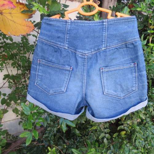 Cute denim shorts by PINK ANGEL for 8 to 9 yr old girl. Unique wide yoked waist. As new.