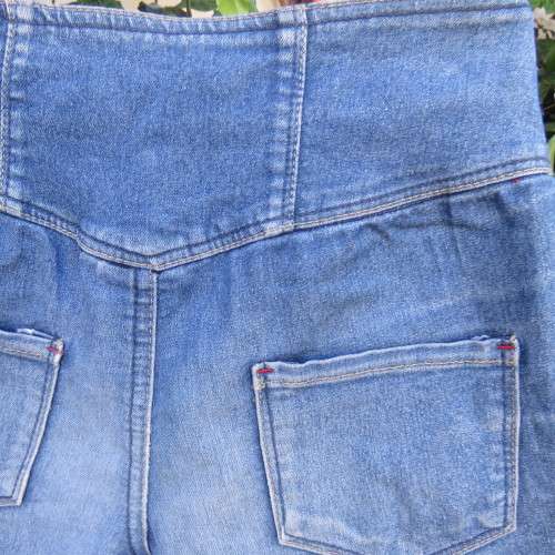 Cute denim shorts by PINK ANGEL for 8 to 9 yr old girl. Unique wide yoked waist. As new.