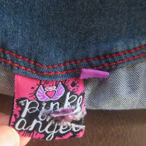Cute denim shorts by PINK ANGEL for 8 to 9 yr old girl. Unique wide yoked waist. As new.
