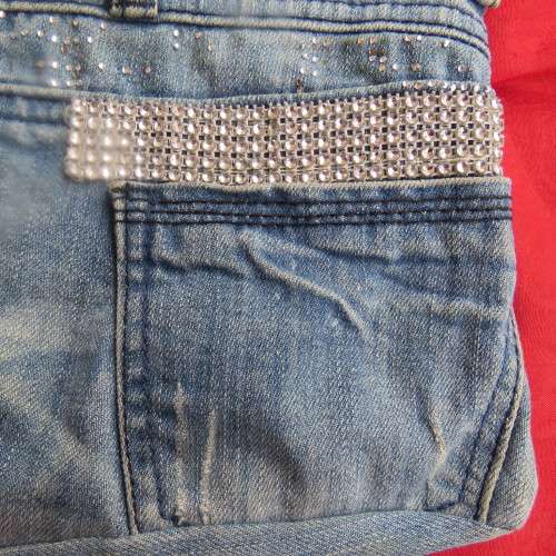 Fashion light blue denim shoulder bag size 28cm x 23cm. Lined with zip-up pocket. Never used.