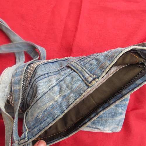 Fashion light blue denim shoulder bag size 28cm x 23cm. Lined with zip-up pocket. Never used.