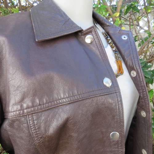 High quality genuine leather brown jacket with collar. By VERA MODA size 36. New condition.