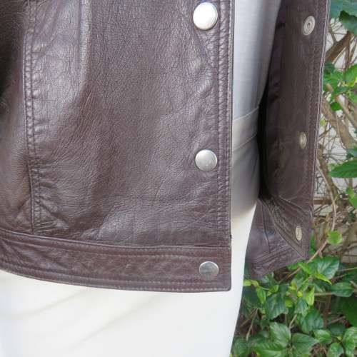 High quality genuine leather brown jacket with collar. By VERA MODA size 36. New condition.