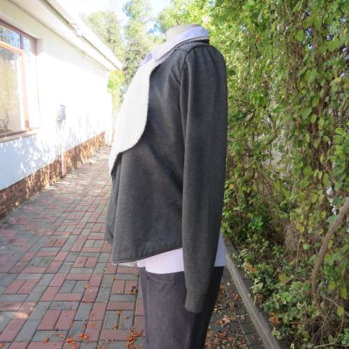 Warm charcoal grey polycotton with beige fluffy inner jacket/cover up size 34/10.Wide shawl collar.