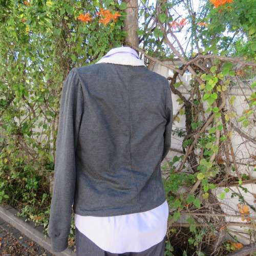 Warm charcoal grey polycotton with beige fluffy inner jacket/cover up size 34/10.Wide shawl collar.