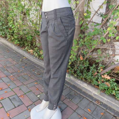 Perfect fit fine black/grey check size 34 low rise pants by LEGIT. Poly/rayon stretch. Leg cuffs.