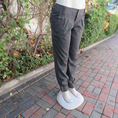 Perfect fit fine black/grey check size 34 low rise pants by LEGIT. Poly/rayon stretch. Leg cuffs.