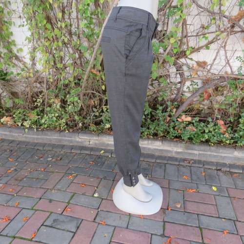 Perfect fit fine black/grey check size 34 low rise pants by LEGIT. Poly/rayon stretch. Leg cuffs.