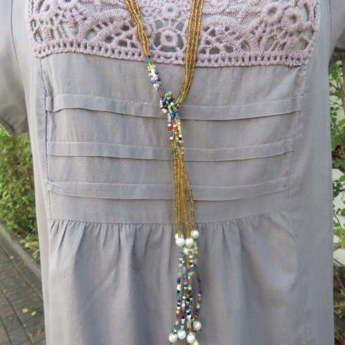 Chic loose ecru colour long top. Capped sleeves.Front lace decoration.Size 36