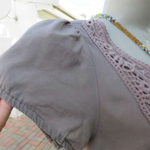 Chic loose ecru colour long top. Capped sleeves.Front lace decoration.Size 36