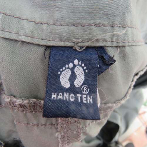 Ladies dark olive green cargo pants. HANG TEN size 36/12. Bellow pockets.Stud/zip decoration.As new