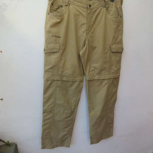 Men`s rip off hiking pants in tan by SCHOFFEL from Germany. Size 38. Pockets .Cotton/nylon.As new