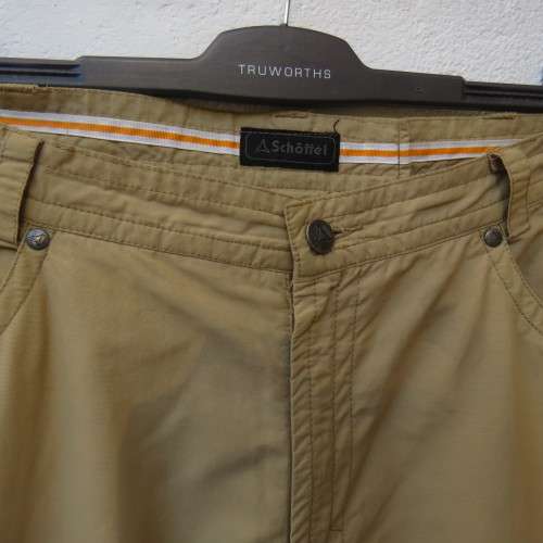 Men`s rip off hiking pants in tan by SCHOFFEL from Germany. Size 38. Pockets .Cotton/nylon.As new