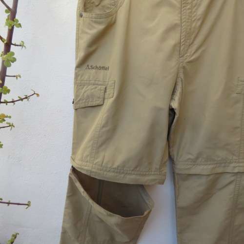 Men`s rip off hiking pants in tan by SCHOFFEL from Germany. Size 38. Pockets .Cotton/nylon.As new