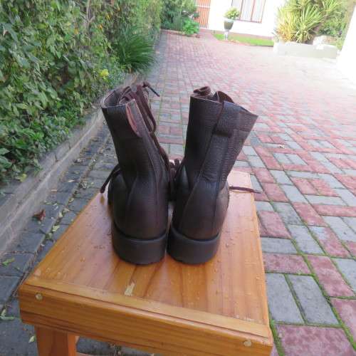 As new pair SADF genuine leather brown boots size 7 army size 255W issued 1997 by DWS.With laces
