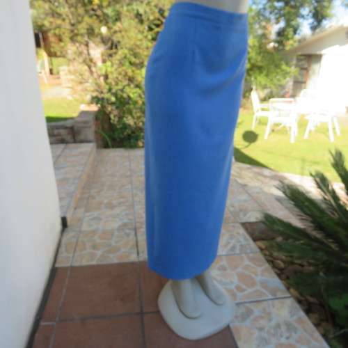 High waisted boutique made cobalt blue pencil skirt size 40/16. Elastic in side waist.Back zip/slit.