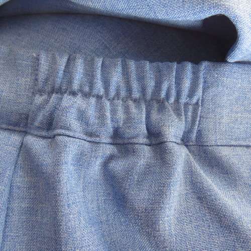 High waisted boutique made cobalt blue pencil skirt size 40/16. Elastic in side waist.Back zip/slit.