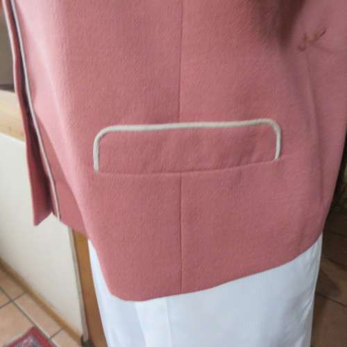 Smart hip length apricot colour short sleeve lined jacket with cream cord edging.Size 42 by MATSON
