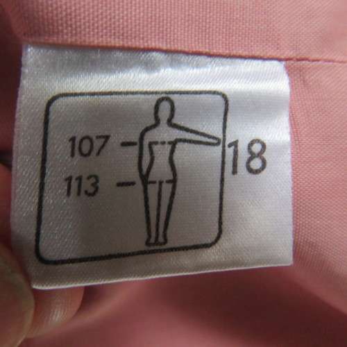 Smart hip length apricot colour short sleeve lined jacket with cream cord edging.Size 42 by MATSON