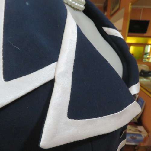 Luxury 80`s navy tailored long sleeve jacket with white stripe decoration..WOOLWORTHS size 36.As new