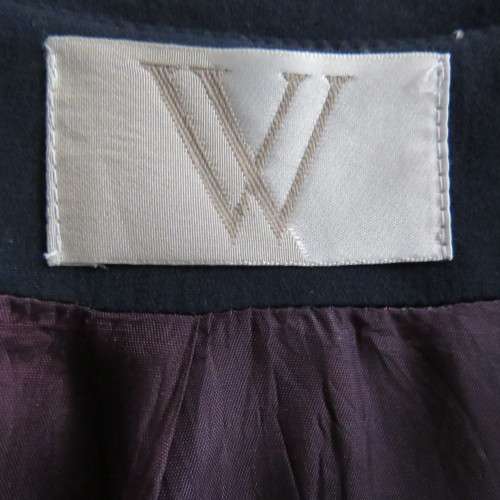 Luxury 80`s navy tailored long sleeve jacket with white stripe decoration..WOOLWORTHS size 36.As new