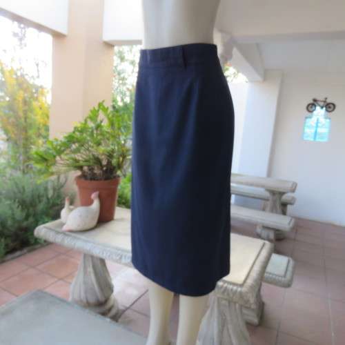 Vintage navy polycotton pencil skirt size 38/14. Perfect fit! Zip and slit at back. 2 button closure